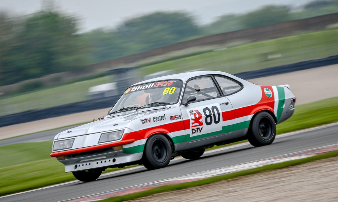 Historic saloon racers in action at the Classic Touring Car Racing Club Donington event
